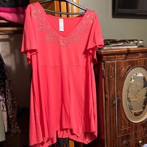 Polyester/rayon top, very soft. Never worn